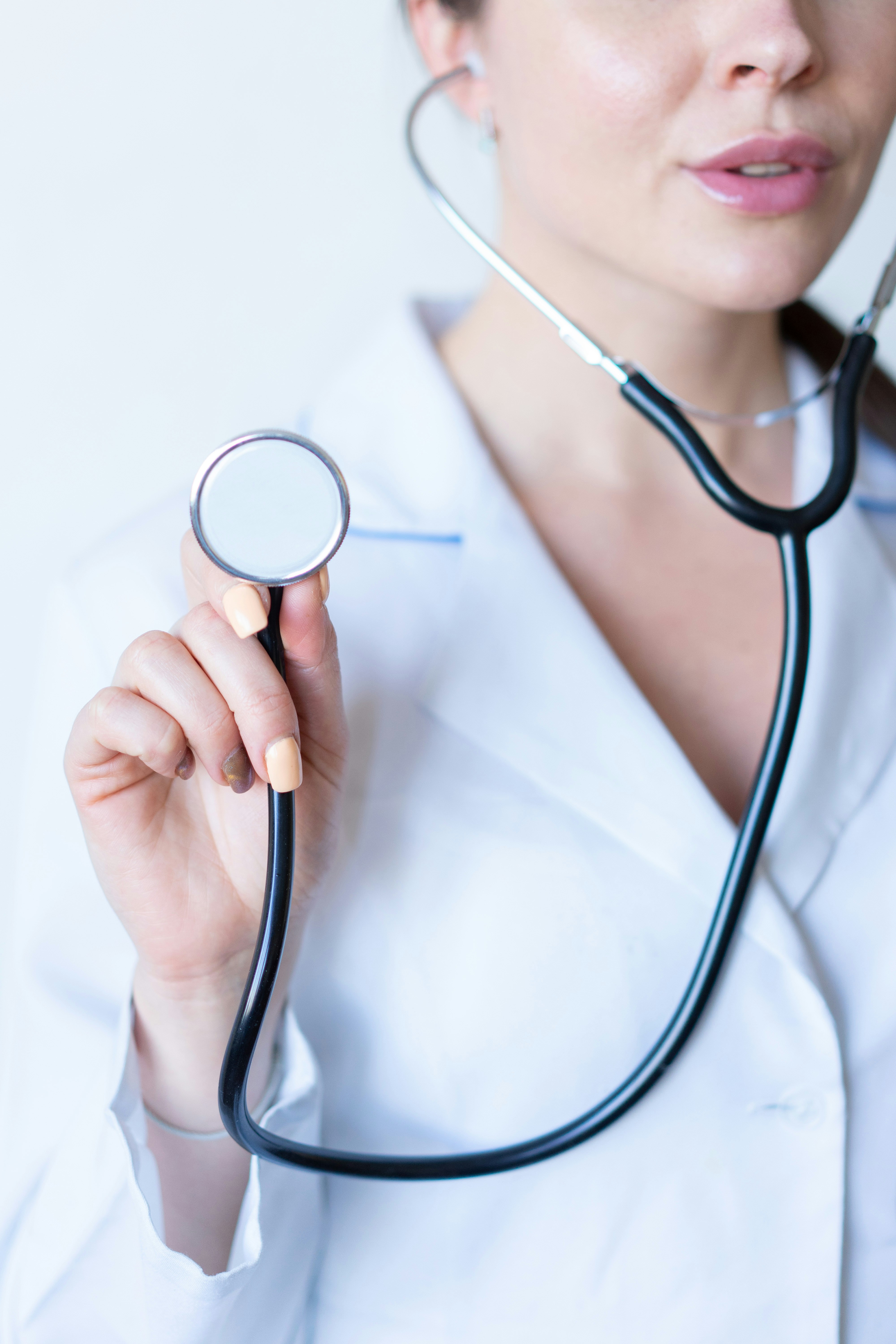GP doctor with stethoscope
